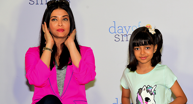 In this file photo taken on November 20, 2019 Indian Bollywood actress Aishwarya Rai Bachchan (L) and daughter Aaradhya Bachchan pose during an event with NGO Smile Train India to bring awareness about cleft lip and palate, in Mumbai. Sujit Jaiswal / AFP