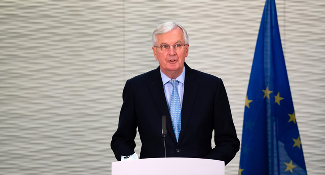 A handout picture released by the European Commission on July 23, 2020 shows EU chief Brexit negotiator Michel Barnier delivering a statement at a press conference at the offices of the Delegation of the European Union to the UK at Europe House in London on July 23, 2020. Niklas HALLE'N / European Commission / AFP