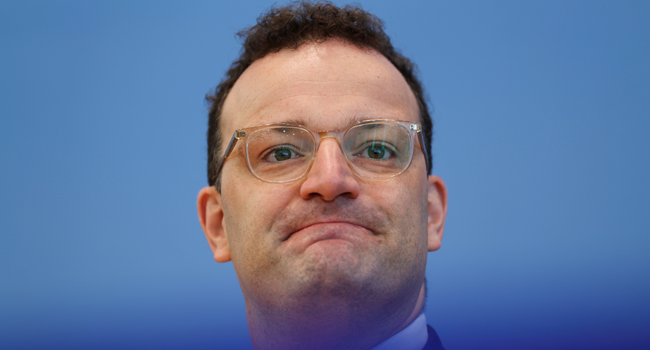 German Health Minister Jens Spahn attends a press conference with the president of the Germany's Robert Koch Institute (RKI, unseen) about 