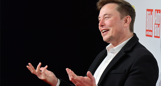 In this file photo Elon Musk, CEO of Tesla and SpaceX, poses on the red carpet as he arrives for the 43rd "Goldenes Lenkrad" (Golden Steering Wheel) awards on November 12, 2019 in Berlin. Tobias SCHWARZ / AFP