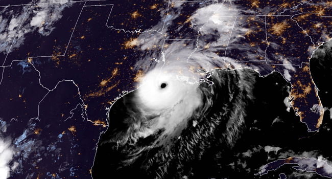 This RAMMB/NOAA satellite image shows Hurricane Laura reaching the coasts of Louisana and Texas on August 26, 2020 at 19H20 Pacific time, (02:20UTC August 27, 2020). RAMMB/NOAA/NESDIS / AFP