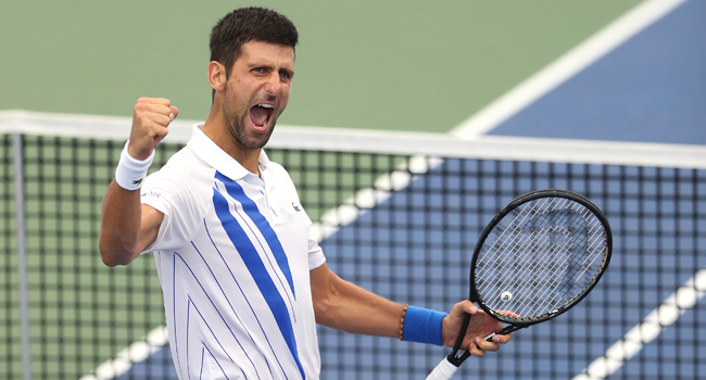 Novak Djokovic of Serbia celebrates after defeating Milos Raonic of Canada in their Men's Singles Final match of the 2020 Western & Southern Open at USTA Billie Jean King National Tennis Center on August 29, 2020 in the Queens borough of New York City. Matthew Stockman/Getty Images/AFP