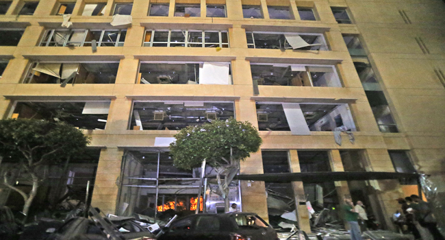 This picture taken on August 4, 2020 shows a general view of destruction outside a building in the centre of Lebanon's capital Beirut, following a massive explosion at the nearby port of Beirut. STR / AFP