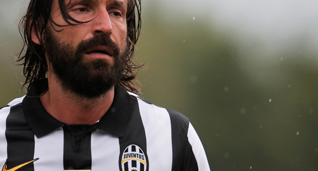 In this file photo taken on August 20, 2014 Juventus A' Italian midfielder Andrea Pirlo looks on during a friendly football match between Juventus A and Juventus B in Villar Perosa near Turin. Andrea Pirlo was named as new Juventus coach - club on August 8, 2020. Marco BERTORELLO / AFP