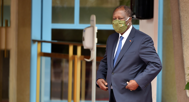 Ivory Coast President Alassane Ouattara wearing a protective mask attends a ceremony to mark the 60th anniversary of the country Independance from France on August 7, 2020 at the presidential palace in Abidjan. SIA KAMBOU / AFP