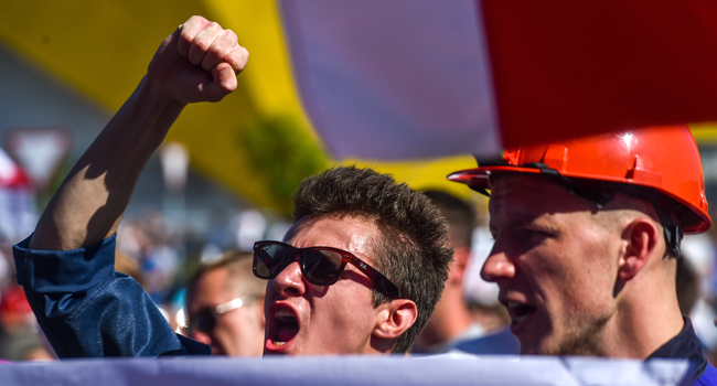 Workers of Minskenergo (Minsk Energy Company) shout during a rally in Minsk, on August 17, 2020, after incumbent president rejected calls to step down in a defiant speech. Sergei GAPON / AFP