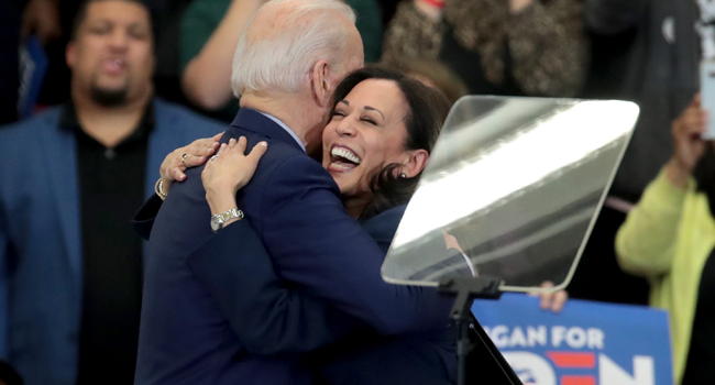 In this file photo taken on March 09, 2020, US Senator Kamala Harris (L) hugs Democratic presidential candidate Joe Biden after introducing him at a campaign rally at Renaissance High School in Detroit, Michigan. SCOTT OLSON / GETTY IMAGES NORTH AMERICA / AFP