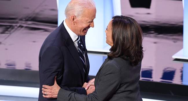  In this file photo taken on July 31, 2019, Democratic presidential hopefuls former Vice President Joe Biden (L) and US Senator from California Kamala Harris greet each other ahead of the second round of the second Democratic primary debate of the 2020 presidential campaign season at the Fox Theatre in Detroit, Michigan. Jim WATSON / AFP