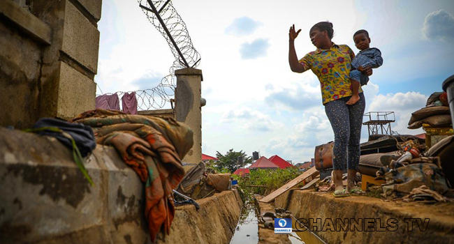 Trademoore Estate, Lugbe, Abuja was flooded after a torrential rainfall on August 26, 2020. Photos: Sodiq Adelakun/ Channels Television