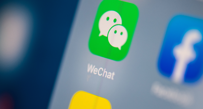 In this file photo illustration taken on July 24, 2019, shows the logo of the Chinese instant messaging application WeChat on the screen of a tablet, in Paris. Martin BUREAU / AFP