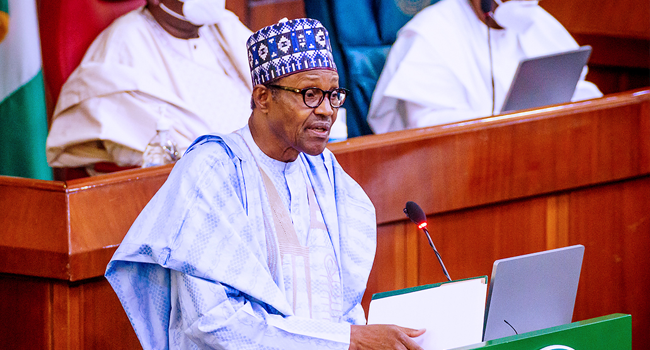 President Muhammadu Buhari speaks to lawmakers at a budget proposal presentation in Abuja on October 8, 2020.