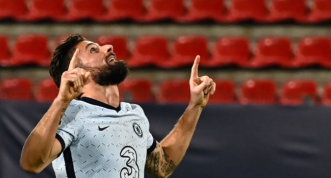Chelsea's French forward Olivier Giroud celebrates after scoring his team's second goal during the UEFA Champions League Group E football match between Stade Rennais FC and Chelsea FC at the Roazhon Park stadium in Rennes, western France, on November 24, 2020. DAMIEN MEYER / AFP