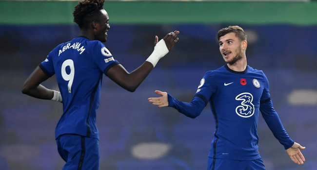 Chelsea's German striker Timo Werner (R) celebrates scoring his team's fourth goal with Chelsea's English striker Tammy Abraham (L) during the English Premier League football match between Chelsea and Sheffield United at Stamford Bridge in London on November 7, 2020. Chelsea won the game 4-1. Mike Hewitt / POOL / AFP