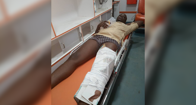 This picture shows a man lying down on a hospital bed after he was reportedly shot by a police officer in Ekiti on November 21, 2020.
