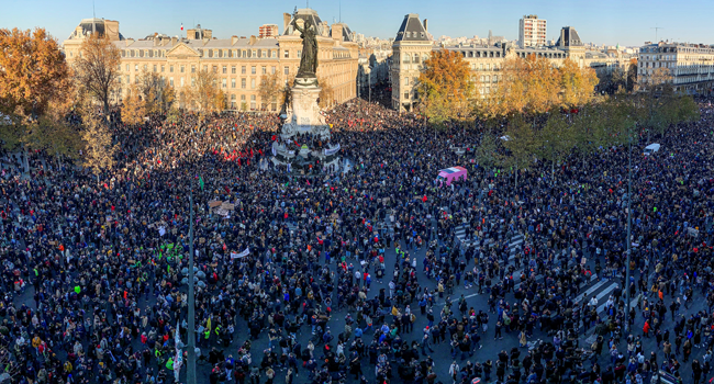 People gather on the Place de La Republique square in central Paris on November 28, 2020 for a demonstration against a new French law on global security which article 24 would restrict sharing images of police, only days after the country was shaken by footage showing officers beating and racially abusing a black man. Thomas COEX / AFP