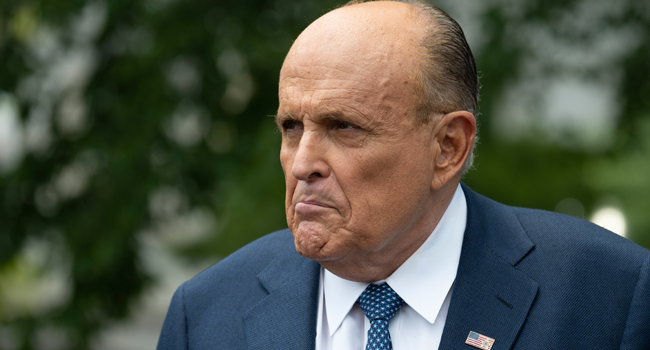 ) In this file photo taken on July 01, 2020 Rudy Giuliani, attorney for US President Donald Trump, speaks at the White House in Washington, DC. JIM WATSON / AFP