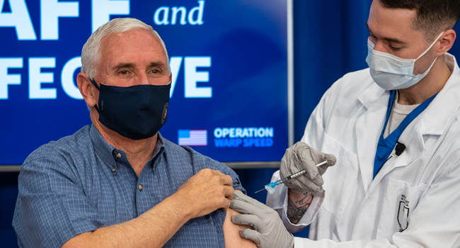 U.S. Vice President Mike Pence receives a COVID-19 vaccine to promote the safety and efficacy of the vaccine at the White House on December, 18, 2020 in Washington, DC. Doug Mills-Pool/Getty Images/AFP
