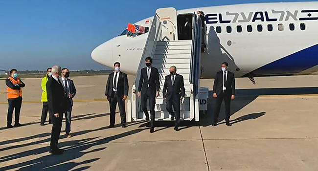 A screen grab from a handout video released by the US embassy in Morocco shows US President's advisor Jared Kushner (L) and Israeli National Security Advisor Meir Ben Shabbat leaving the plane upon landing, in Moroco's capital Rabat, on December 22, 2020, on the first Israel-Morocco direct commercial flight, marking the latest US-brokered diplomatic normalisation deal between the Jewish state and an Arab country. US EMBASSY IN MOROCCO / AFP