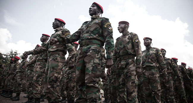 In this file photo taken on August 04, 2018 New recruits for the Central African Armed Forces (FACA) march in formation during an award presentation in Berengo. FLORENT VERGNES / AFP