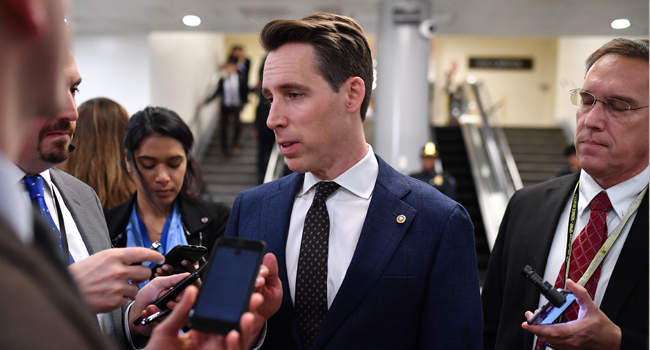 In this file photo taken on January 24, 2020, US Senator Josh Hawley, Republican of Missouri, speaks to the press during a break in the Senate impeachment trial of US President Donald Trump, at the US Capitol in Washington, DC. Mandel NGAN / AFP