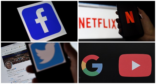A photo combination created on December 10, 2020 showing visual identities of internet giants Facebook, Netflix, Twitter and Google.