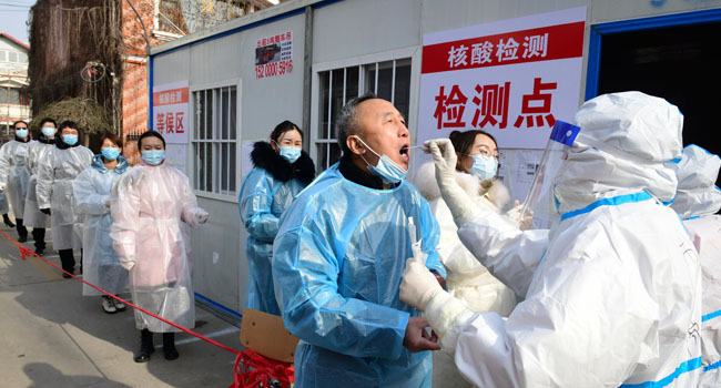 China Places Three Million Under Lockdown Amid COVID-19 Spike