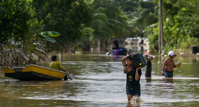 Six Dead, Nearly 50,000 Evacuated In Malaysia Floods