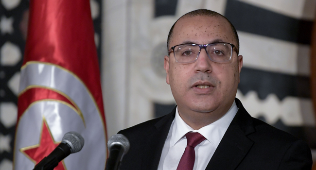 Tunisian Prime Minister Hichem Mechichi speaks during a press conference to announce a wide cabinet reshuffle in the capital Tunis, on January 16, 2021. FETHI BELAID / AFP