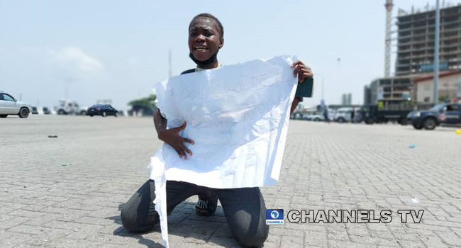 A protester decried the reopening of the Lekki toll gate on February 13, 2021.