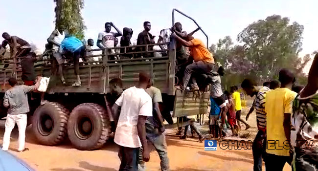 Soldiers Escort Rescued Kaduna Students To Pick Belongings From School