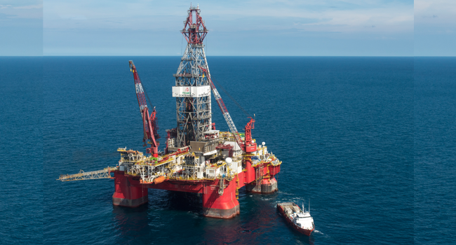 This file aerial picture taken on August 30, 2013 shows the Centenario exploration oil rig, operated by Mexican company "Grupo R" and working for Mexico's state-owned oil company PEMEX, in the Gulf of Mexico. Omar TORRES / AFP