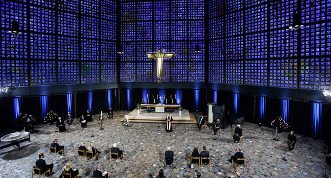 Georg Bätzing, Chairman of the German Bishops' Conference (DBK), stands in front of the altar during an ecumenical service for Germany's victims of the coronavirus (Covid-19) pandemic at Berlin's Kaiser Wilhelm Memorial Church on April 18, 2021. Germany holds a national memorial service on April 18 for its 80,000 victims of the coronavirus pandemic, sharing the pain of grieving families and those who died alone because of Covid curbs. Gordon Welters / POOL / AFP