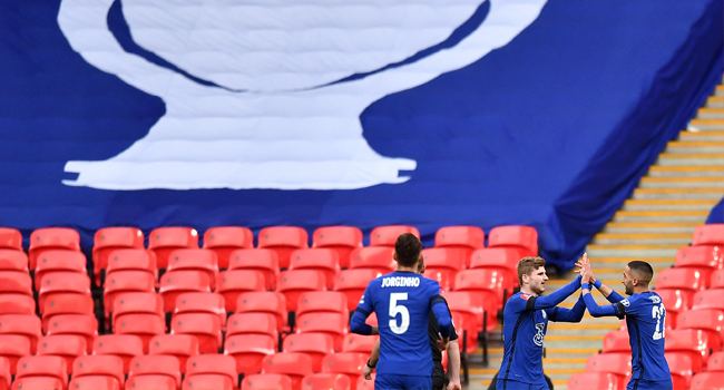 Chelsea's Moroccan midfielder Hakim Ziyech (R) celebrates scoring his team's first goal during the English FA Cup semi-final football match between Chelsea and Manchester City at Wembley Stadium in north west London on April 17, 2021. Ben STANSALL / POOL / AFP