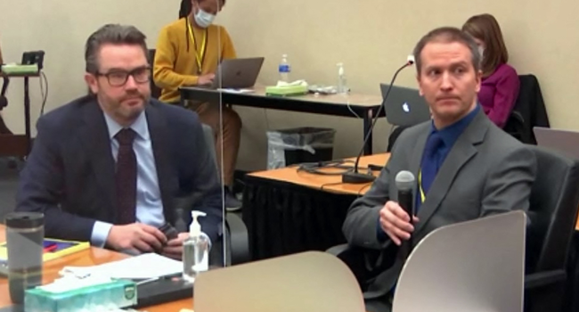 In this file photo taken on April 15, 2021 this screenshot obtained from video feed via Court TV, shows former Minneapolis police officer Derek Chauvin(R), who is accused of killing George Floyd, addressing the court, telling the presiding judge that he has decided not to testify in his own defense. STR / Court TV / AFP