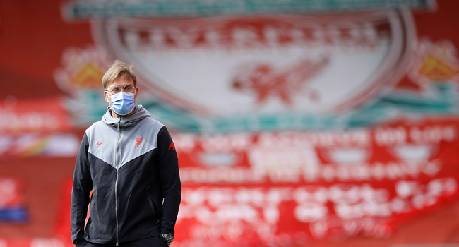 Liverpool's German manager Jurgen Klopp walks on the pitch ahead of the English Premier League football match between Liverpool and Newcastle United at Anfield in Liverpool, north west England on April 24, 2021. DAVID KLEIN / POOL / AFP