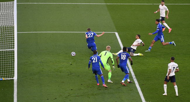 Manchester City's Brazilian striker Gabriel Jesus (C right) shoots to score his team's second goal during the English Premier League football match between Leicester City and Manchester City at King Power Stadium in Leicester, central England on April 3, 2021. Michael Regan / POOL / AFP