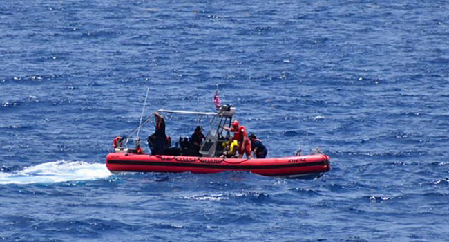 In this handout image courtesy of the US Coast Guard the Coast Guard Cutter Resolute small boat crew rescues 8 people from the water approximately 18 miles southwest of Key West, Florida, May 27,2021.