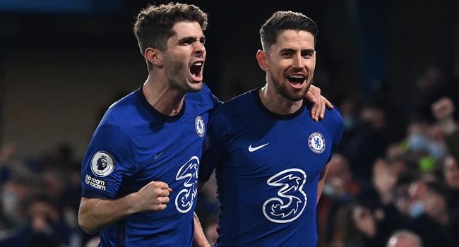 Chelsea's Italian midfielder Jorginho (R) celebrates scoring his team's second goal during the English Premier League football match between Chelsea and Leicester City at Stamford Bridge in London on May 18, 2021. Glyn KIRK / POOL / AFP