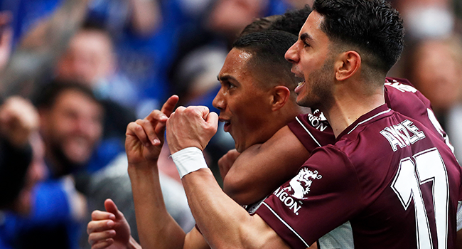 Leicester City's Belgian midfielder Youri Tielemans (L) celebrates scoring his team's first goal with Leicester City's Spanish striker Ayoze Perez (R) during the English FA Cup final football match between Chelsea and Leicester City at Wembley Stadium in north west London on May 15, 2021. MATTHEW CHILDS / POOL / AFP