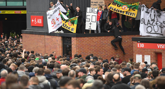 United’s Game Vs Liverpool Delayed As Fans Storm Old Trafford In Anti-Glazer Protest