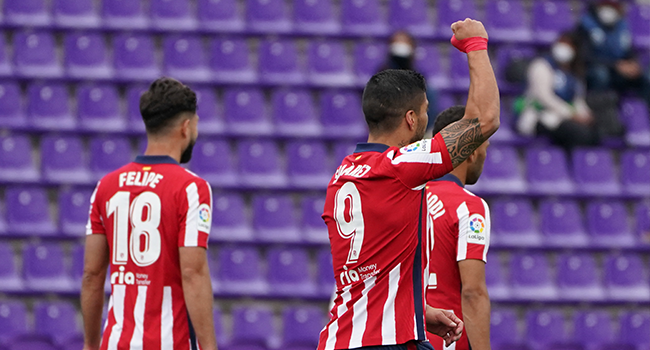 Atletico Madrid's Uruguayan forward Luis Suarez celebrates after scoring during the Spanish league football match Real Valladolid FC against Club Atletico de Madrid at the Jose Zorilla stadium in Valladolid on May 22, 2021. CESAR MANSO / AFP