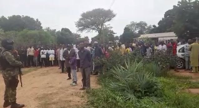 Crowd gather within the premises of the polytechnic where several students and lecturers were kidnnaped.