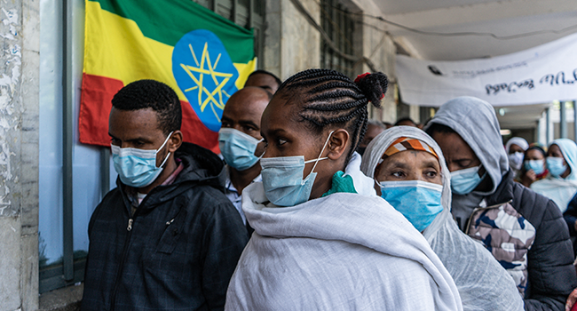 People wait to cast their ballots at a polling station in Addis Ababa, Ethiopia, on June 21, 2021. Amanuel Sileshi / AFP