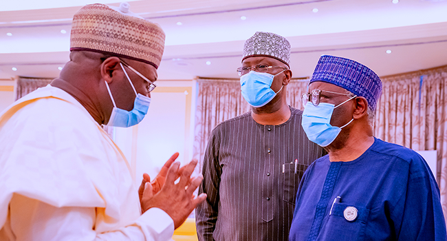 President Buhari receives a briefing from Chairman and Members of the Independent National Electoral Commission (INEC) in State House on June 1, 2021. Bayo Omoboriowo/State House