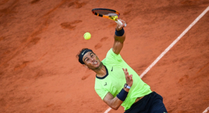 Spain's Rafael Nadal serves the ball to Serbia's Novak Djokovic during their men's singles semi-final tennis match on Day 13 of The Roland Garros 2021 French Open tennis tournament in Paris on June 11, 2021. Anne-Christine POUJOULAT / AFP