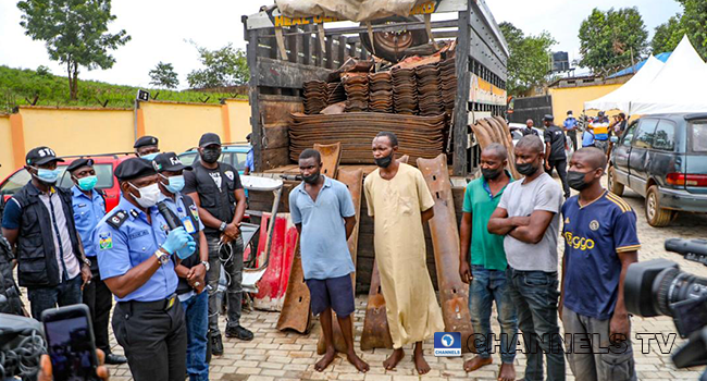 The police paraded persons suspected to have vandalised rail tracks in June 2021.