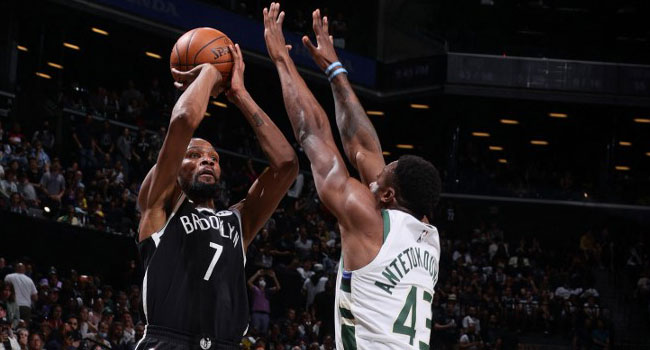 Kevin Durant #7 of the Brooklyn Nets shoots the ball during the game against the Milwaukee Bucks during Round 2, Game 1 of the 2021 NBA Playoffs on June 5, 2021 at Barclays Center in Brooklyn, New York.