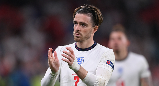 England's midfielder Jack Grealish greets the fans after their loss in the UEFA EURO 2020 final football match between Italy and England at the Wembley Stadium in London on July 11, 2021. Laurence Griffiths / POOL / AFP