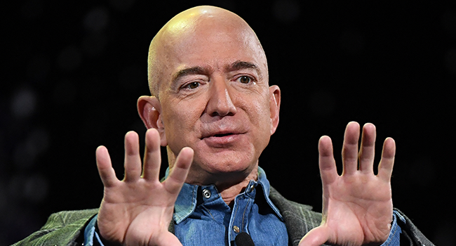 In this file photo Amazon Founder and CEO Jeff Bezos addresses the audience during a keynote session at the Amazon Re:MARS conference on robotics and artificial intelligence at the Aria Hotel in Las Vegas, Nevada on June 6, 2019. Mark RALSTON / AFP