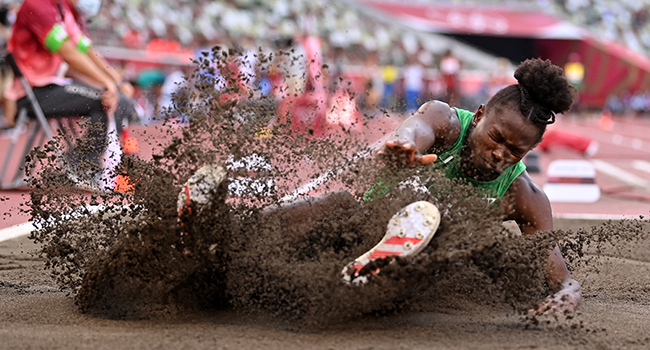 Nigeria's Ese Brume competes in the women's long jump qualification during the Tokyo 2020 Olympic Games at the Olympic Stadium in Tokyo on August 1, 2021. Andrej ISAKOVIC / AFP